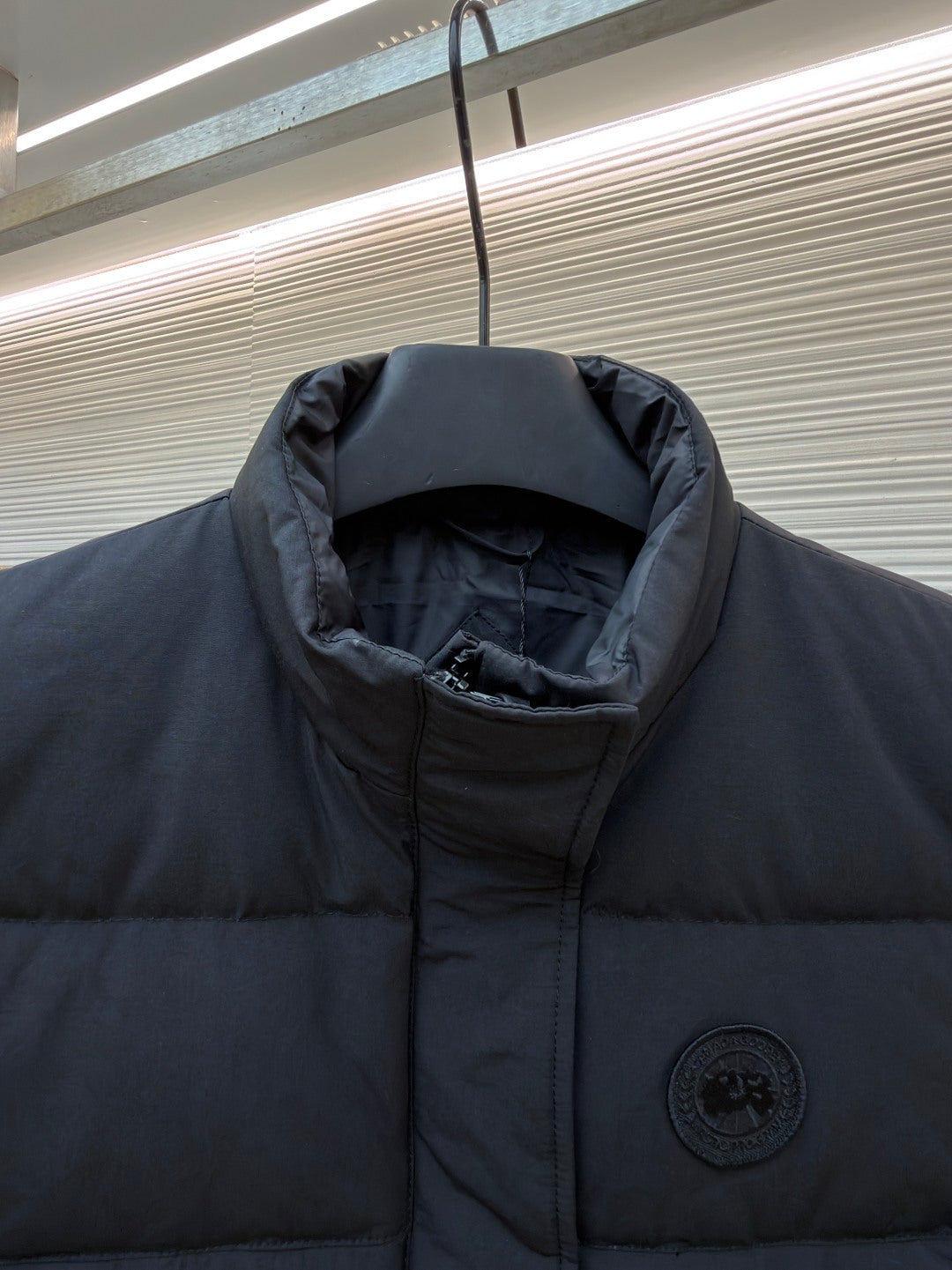 Disc Badge Down Gilet