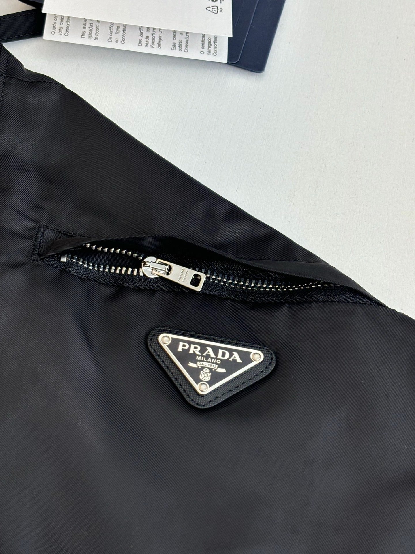 Prada Re-Nylon jas met capuchon